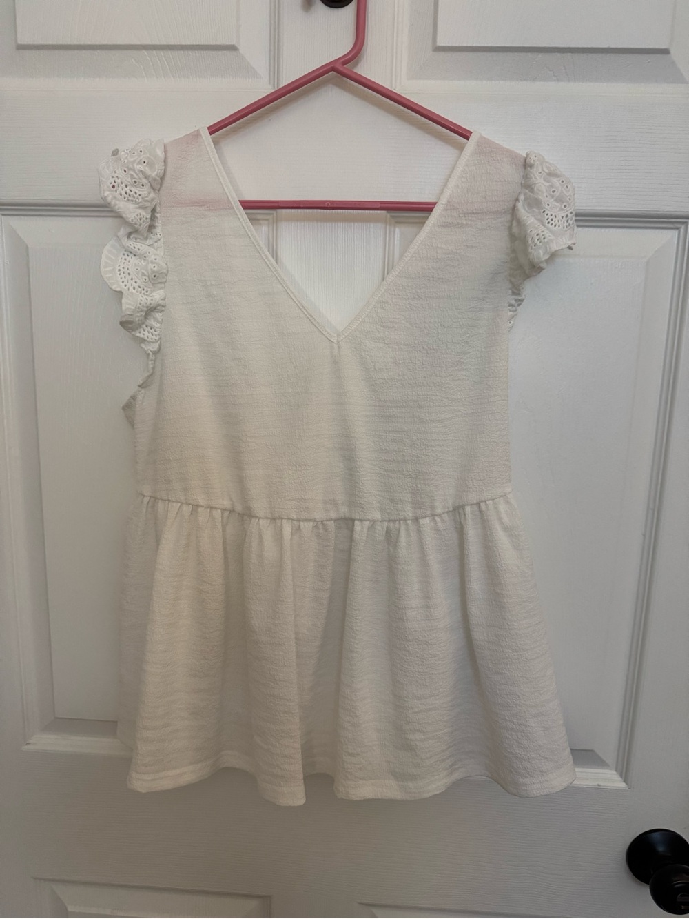 V‑Neck Cream Peplum Tunic with Eyelet Ruffle Sleeves